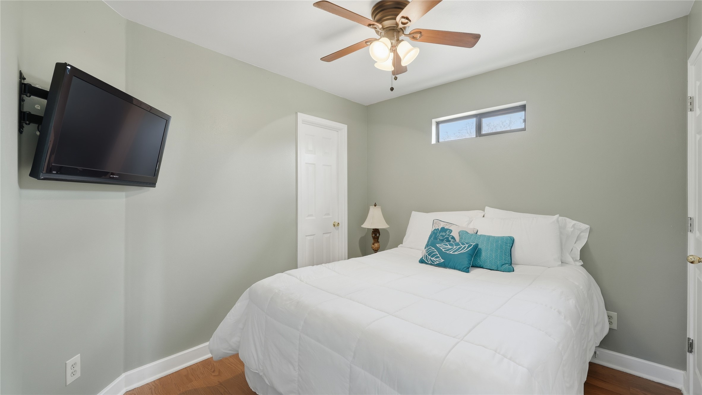 182 Little Ranch Road Red Rock, TX 78662 - Photo 37 of 40 Bedroom with ceiling fan and wood finished floors
