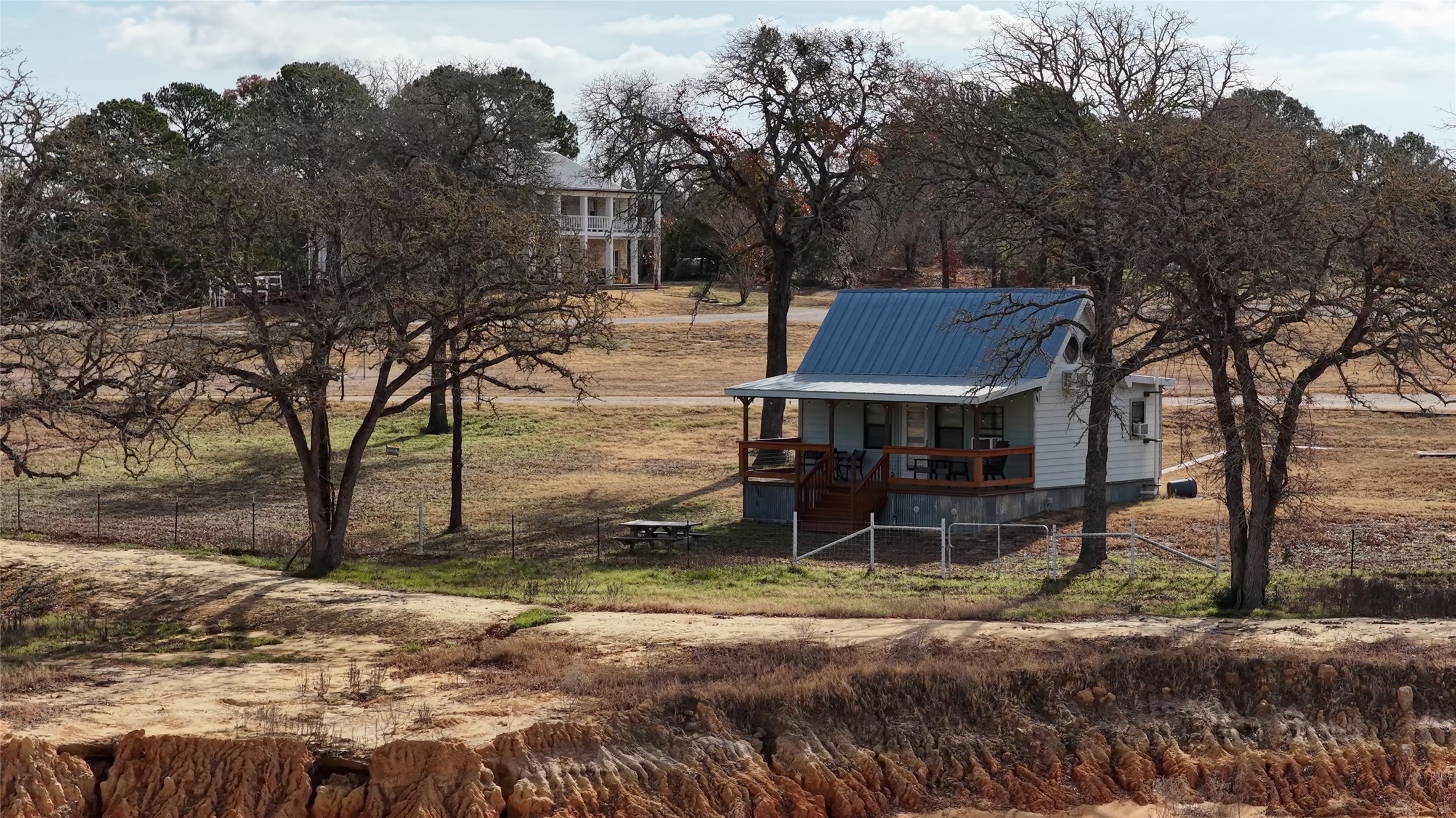 182 Little Ranch Road Red Rock, TX 78662 - Photo 4 of 40 View of yard with a porch and a view of countryside