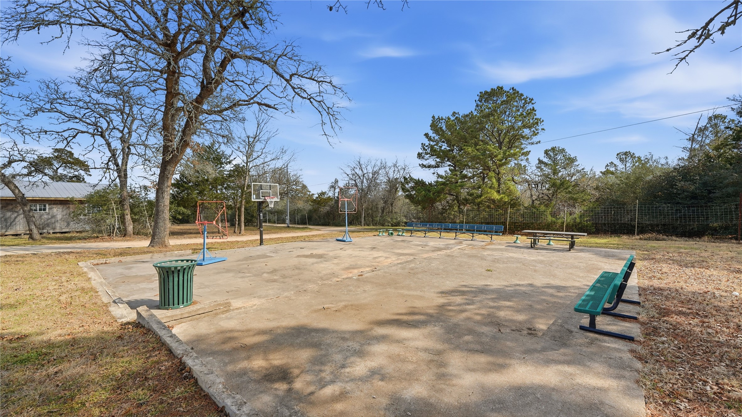 182 Little Ranch Road Red Rock, TX 78662 - Photo 9 of 40 View of home's community featuring community basketball court
