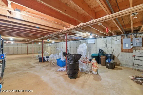 a view of a garage with a table and chairs