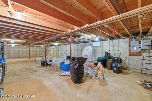 a view of a garage with a table and chairs