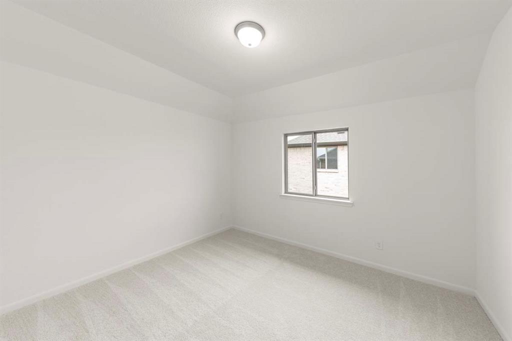 1443 Canadian Lane Van Alstyne, TX 75495 - Photo 19 of 24 20-1443-canadian-ln-van-alstyne-tx-secondary-bedroom-interior