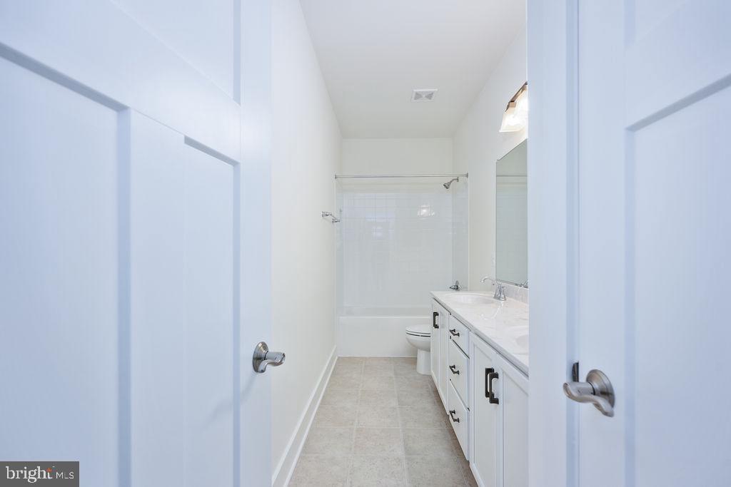 1985 Garrisonville Road Stafford, VA 22556 - Photo 14 of 34 Bright and airy modern bathroom retreat.