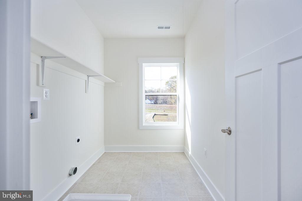 1985 Garrisonville Road Stafford, VA 22556 - Photo 19 of 34 Bright and airy laundry space.