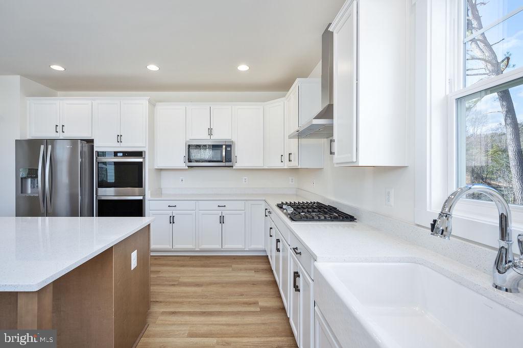 1985 Garrisonville Road Stafford, VA 22556 - Photo 26 of 34 Modern kitchen with sleek finishes.