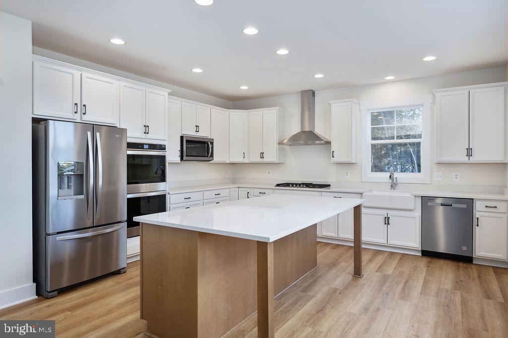 1985 Garrisonville Road Stafford, VA 22556 - Photo 29 of 34 Modern kitchen with sleek finishes.