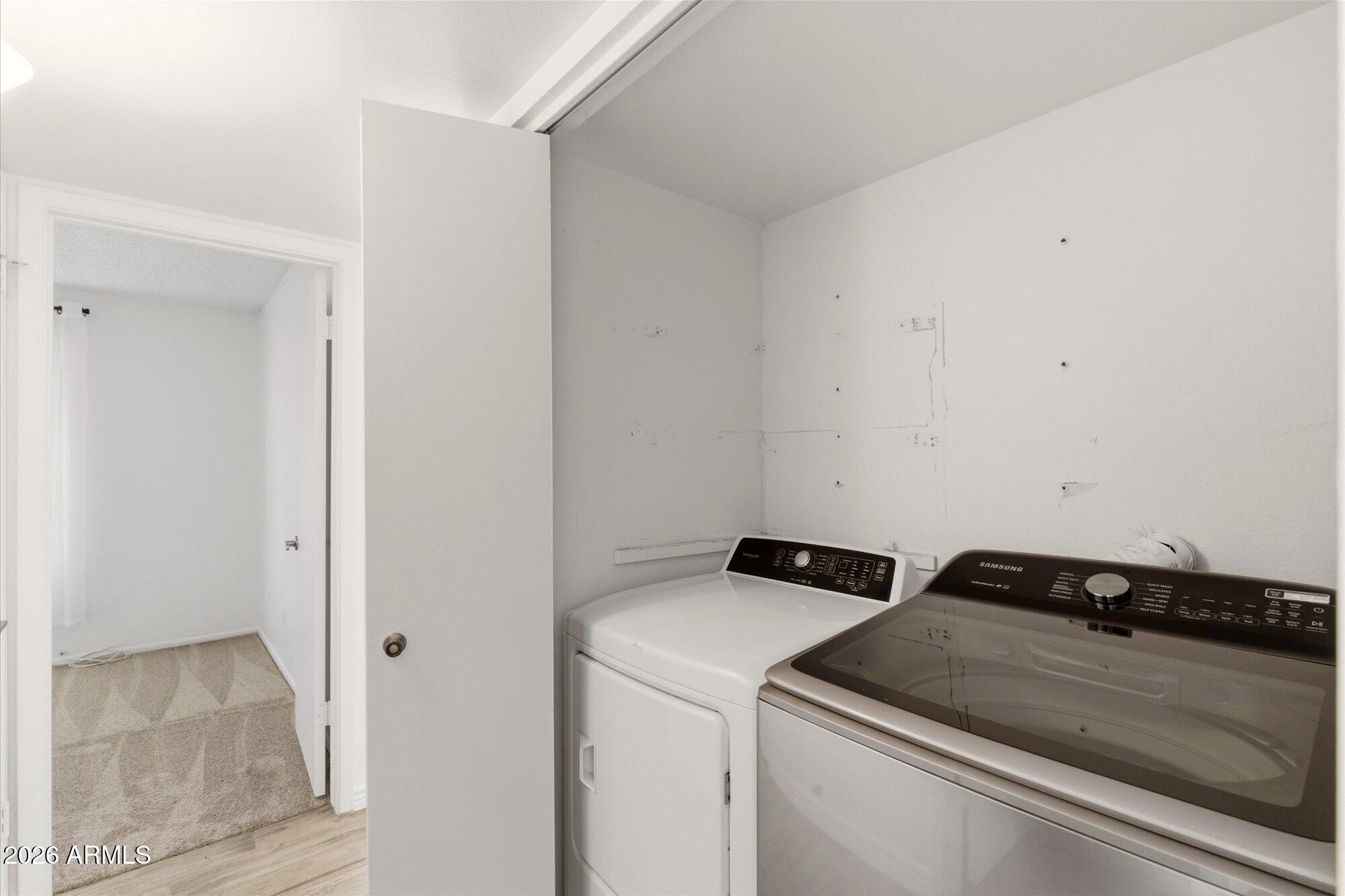 4208 East Carson Road Phoenix, AZ 85042 - Photo 19 of 25 a utility room with dryer and washer