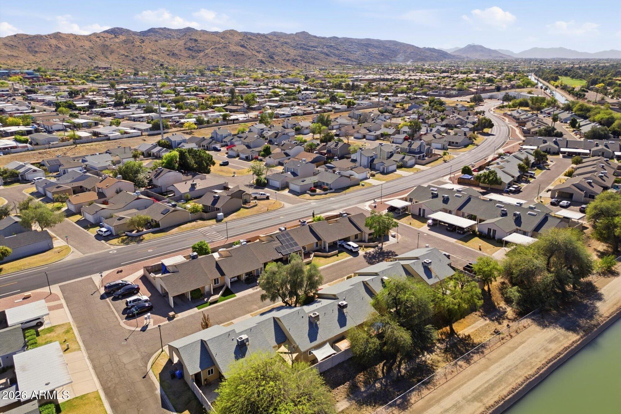 4208 East Carson Road Phoenix, AZ 85042 - Photo 23 of 25 an aerial view of a city with lots of residential buildings