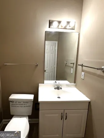 a bathroom with a sink and a toilet