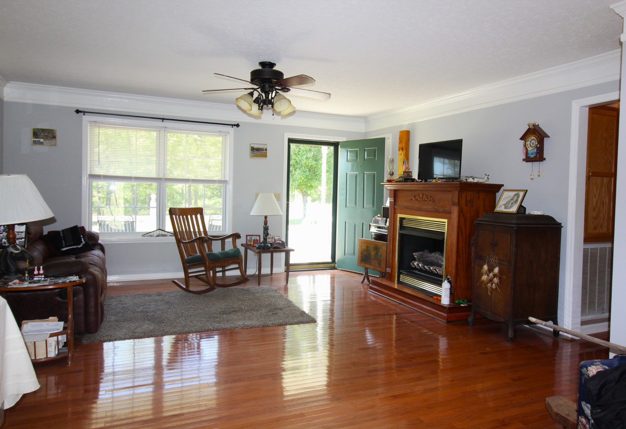 3721 Armstrong Road Springfield, TN 37172 - Photo 3 of 9 a living room with furniture a fireplace and a large window