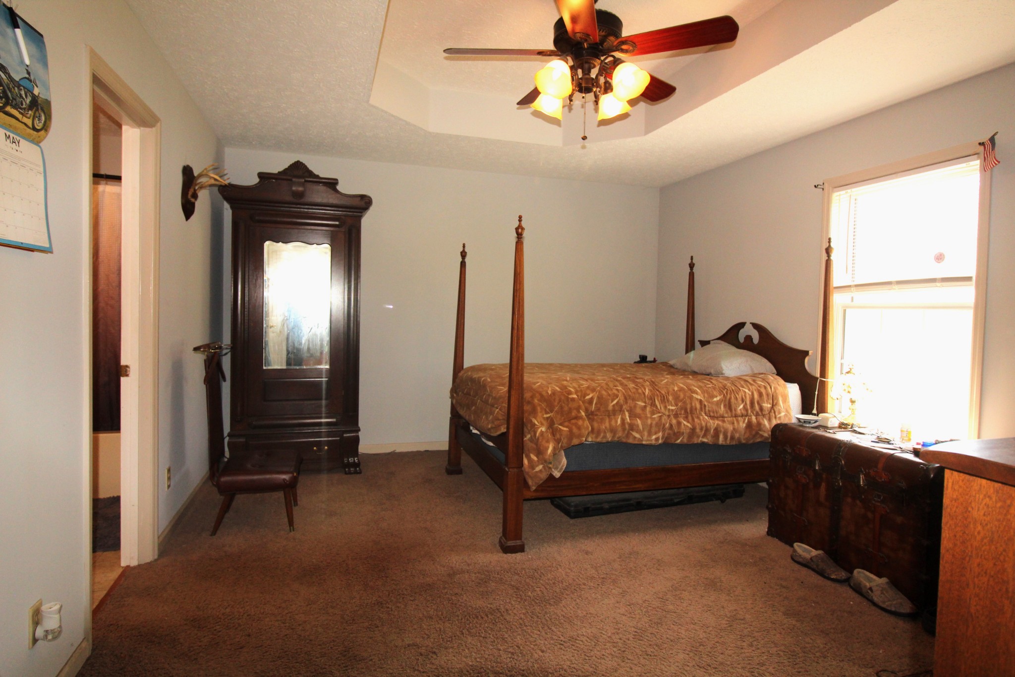 3721 Armstrong Road Springfield, TN 37172 - Photo 5 of 9 a bedroom with a bed and a chandelier