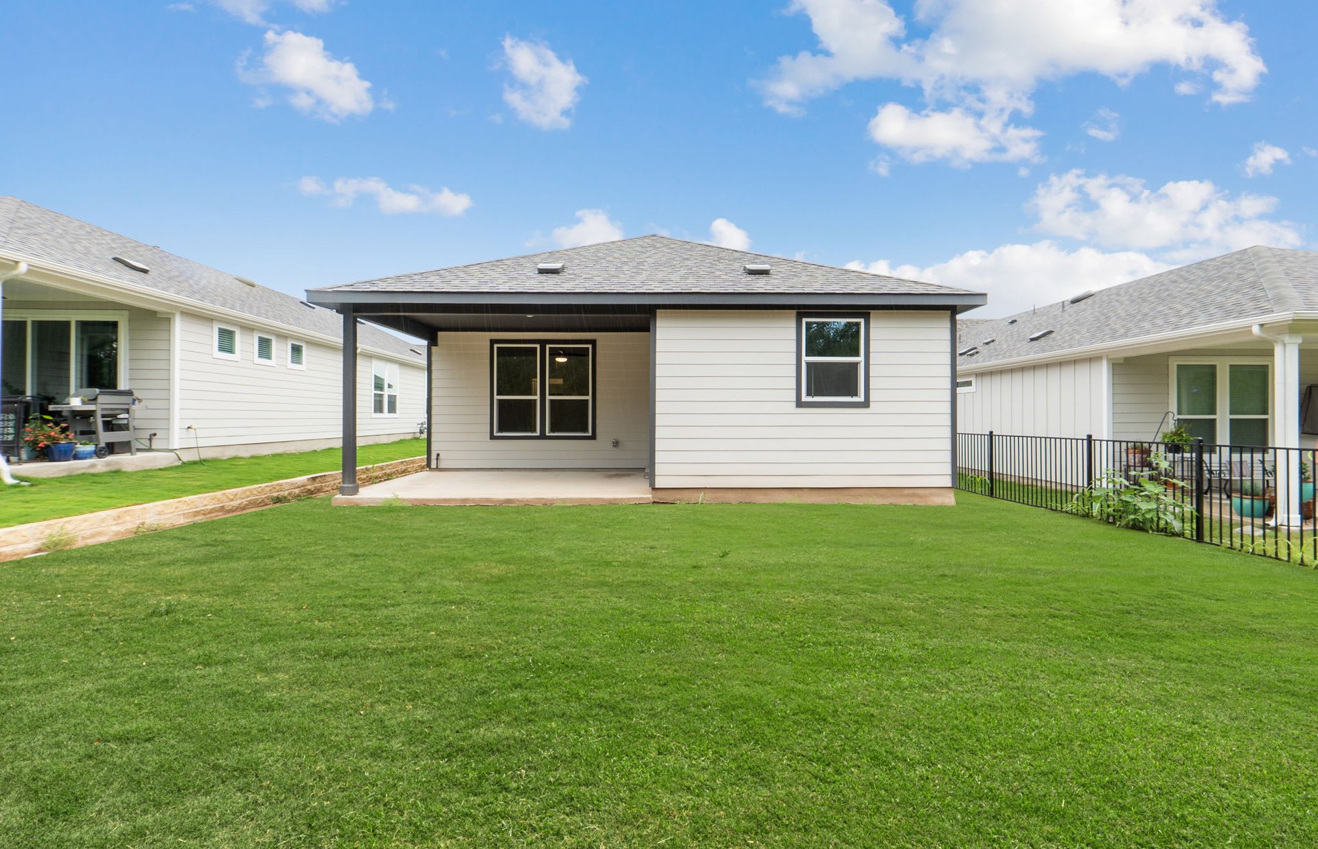 1010 Martingale Street Georgetown, TX 78633 - Photo 18 of 23 a view of a house with backyard and garden