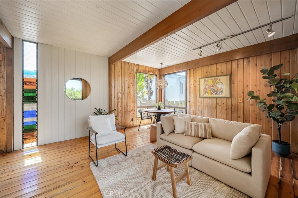 1515 9th Street Los Osos, CA 93402 - Photo 13 of 69 a living room with furniture and a large window