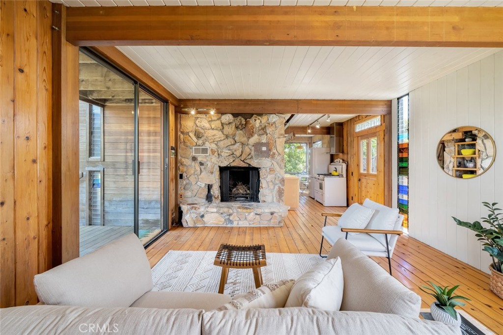 1515 9th Street Los Osos, CA 93402 - Photo 15 of 69 a living room with furniture and a fireplace