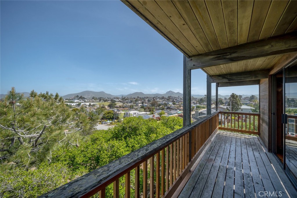 1515 9th Street Los Osos, CA 93402 - Photo 21 of 69 a view of a balcony with wooden floor