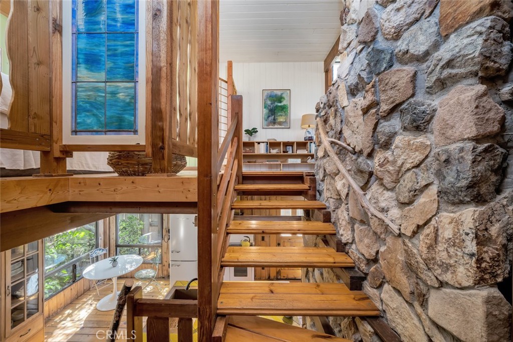 1515 9th Street Los Osos, CA 93402 - Photo 26 of 69 a view of a balcony with chairs and floor to ceiling window
