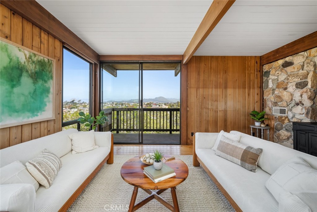 1515 9th Street Los Osos, CA 93402 - Photo 29 of 69 a living room with furniture and a large window
