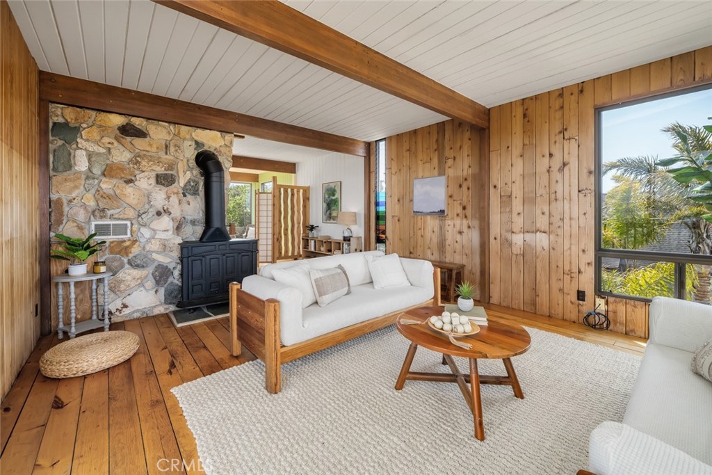 1515 9th Street Los Osos, CA 93402 - Photo 32 of 69 a living room with furniture and a large window
