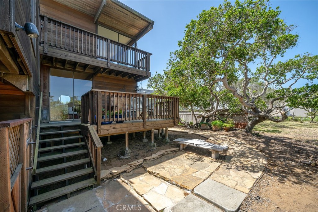 1515 9th Street Los Osos, CA 93402 - Photo 45 of 69 a view of a patio with a table and chairs