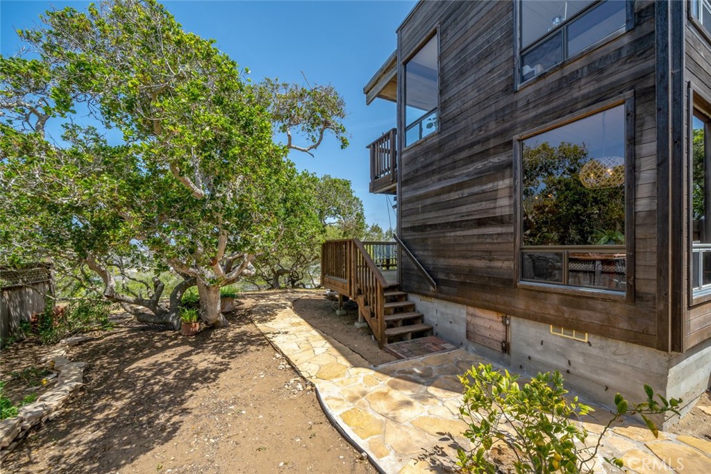 1515 9th Street Los Osos, CA 93402 - Photo 50 of 69 a view of a backyard with sitting area