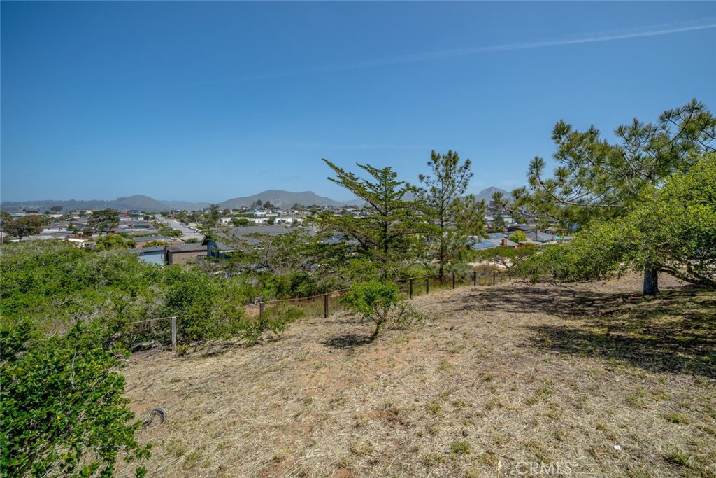 1515 9th Street Los Osos, CA 93402 - Photo 53 of 69 a view of a road with a building in the background