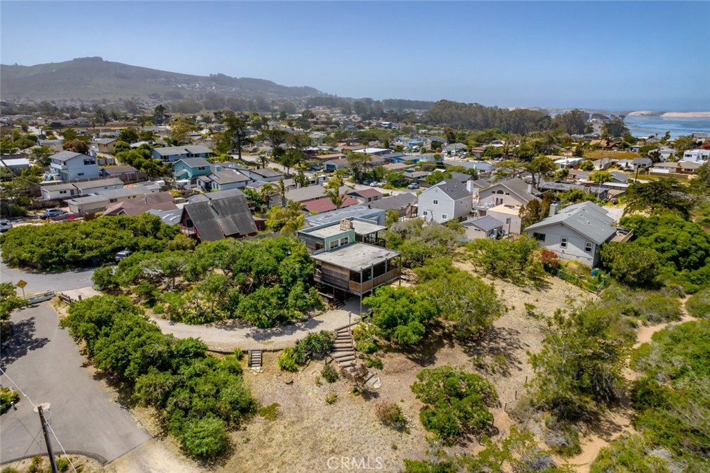 1515 9th Street Los Osos, CA 93402 - Photo 66 of 69 an aerial view of residential house with outdoor space and trees all around