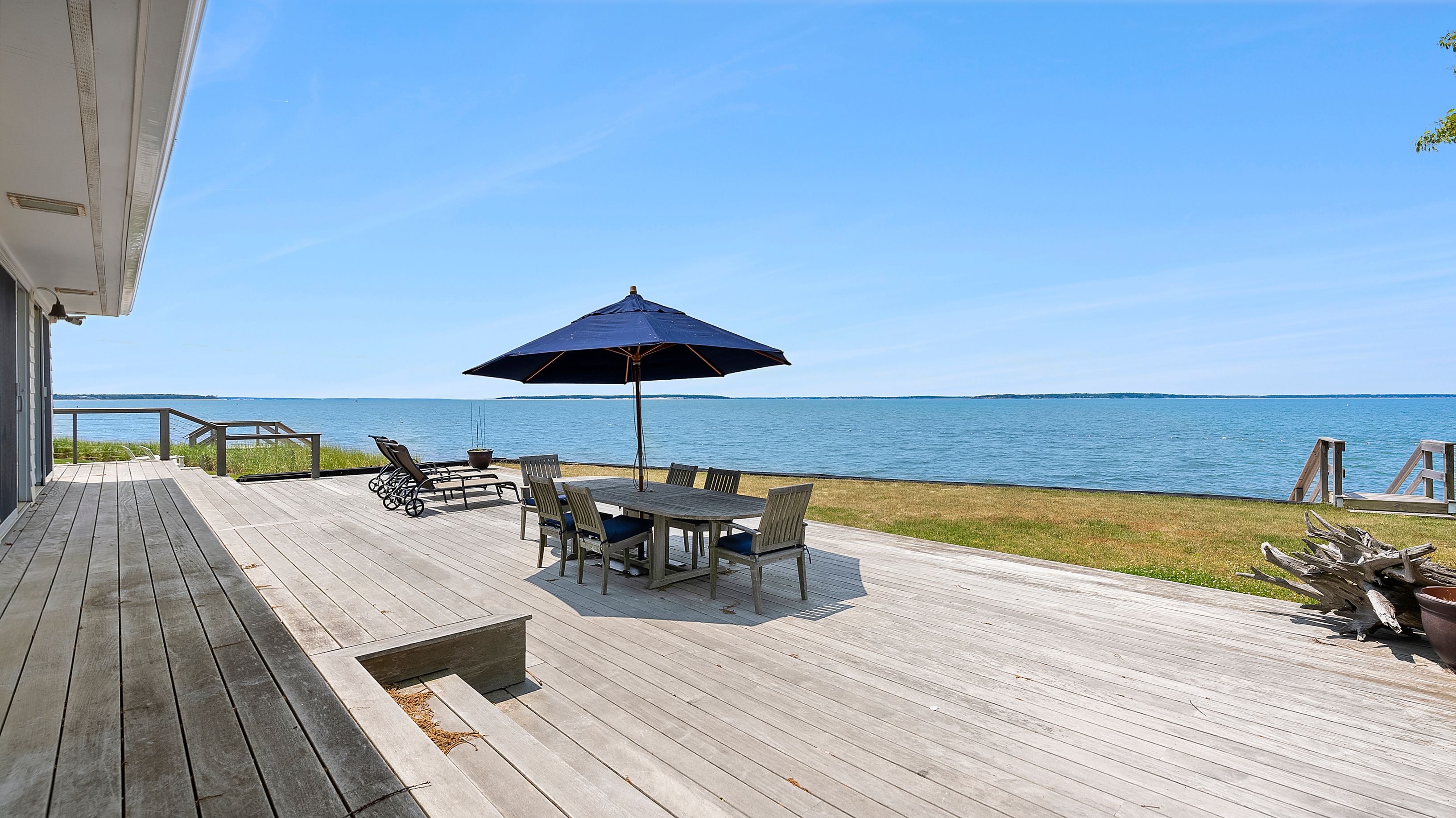55 East Shore Road Southampton, NY 11968 - Photo 2 of 19 a view of a terrace with seating space