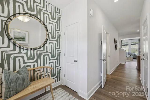 a view of a entryway with wooden floor