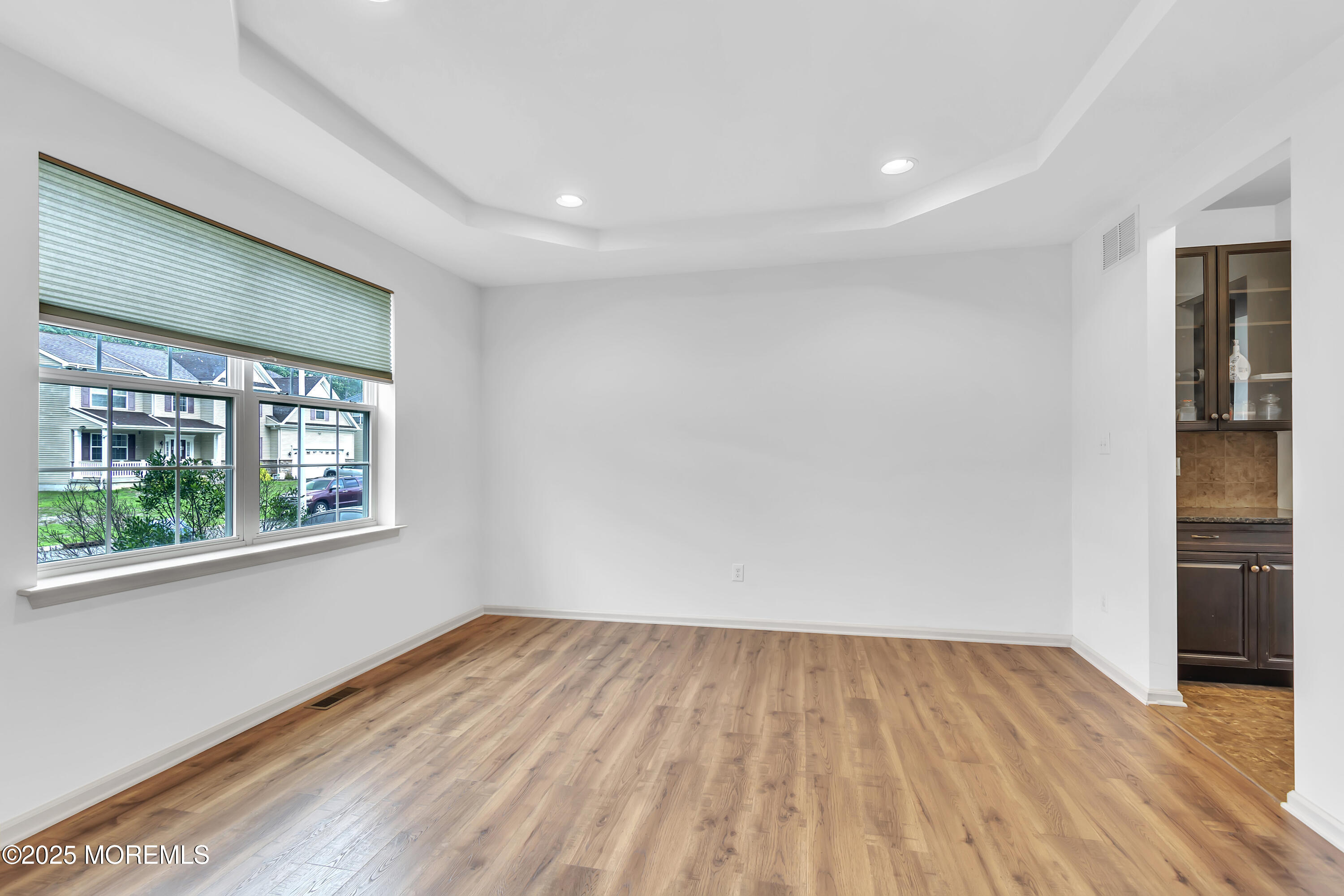4 Christopher Drive Howell, NJ 07731 - Photo 27 of 41 wooden floor in an empty room with a window