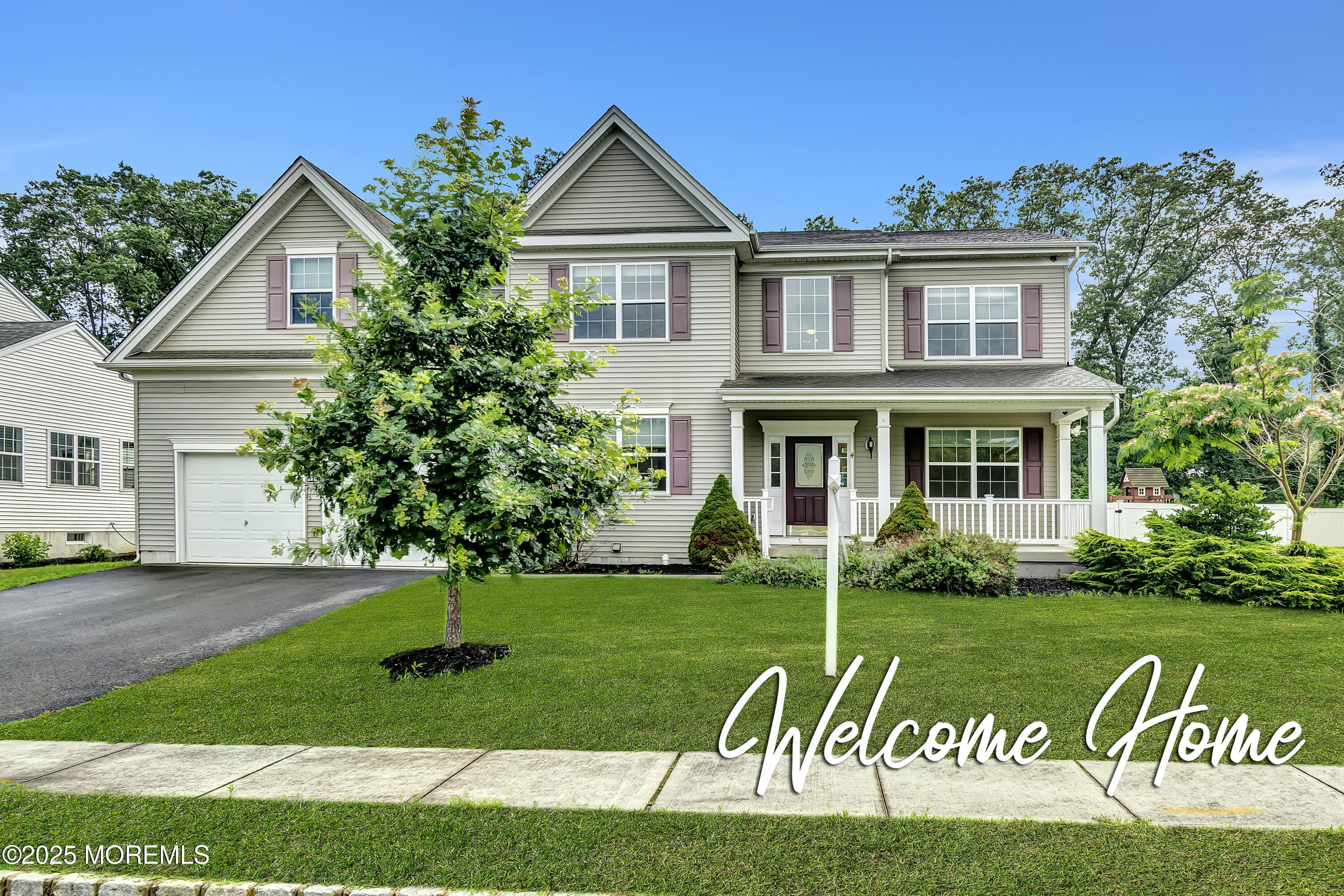 4 Christopher Drive Howell, NJ 07731 - Photo 37 of 41 a front view of a house with a yard