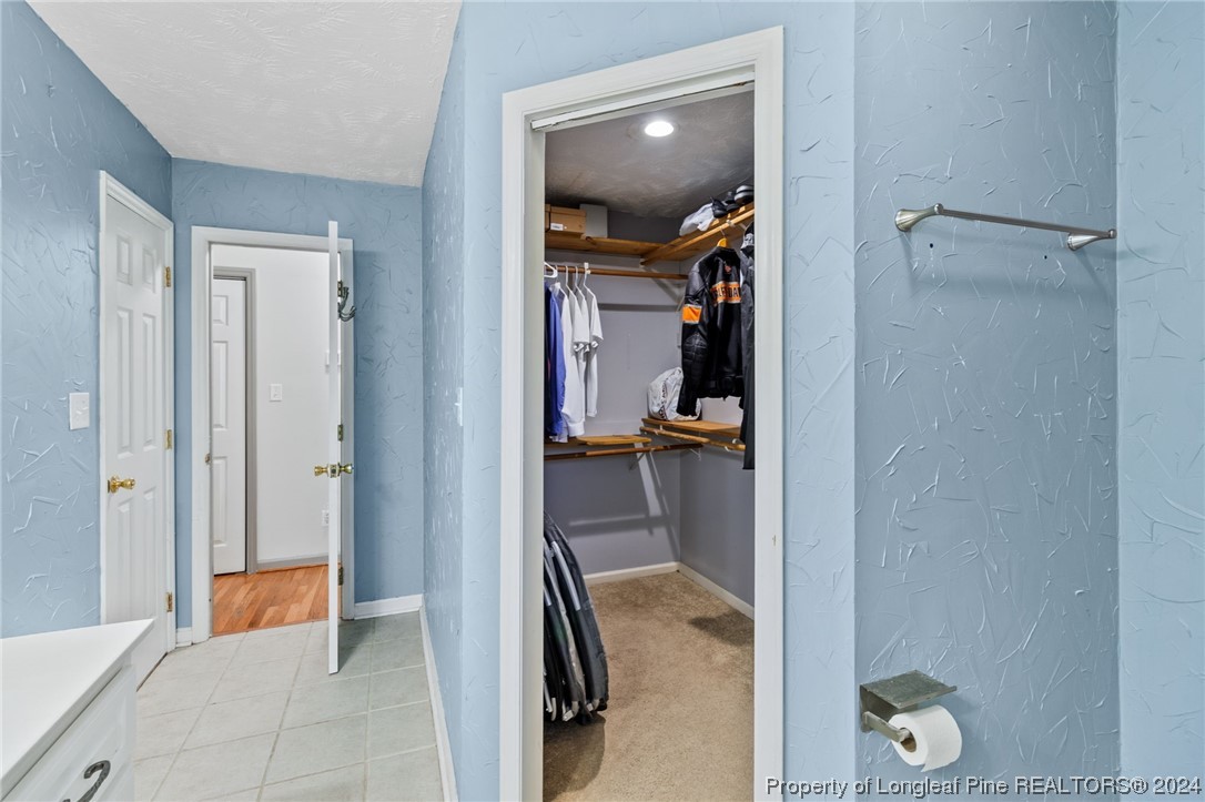 1177 Palestine Road Linden, NC 28356 - Photo 32 of 46 a view of a hallway with bathroom and shower