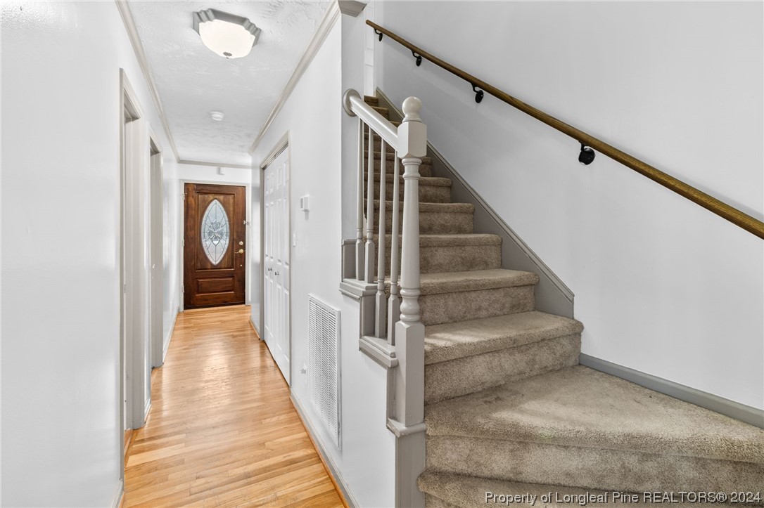 1177 Palestine Road Linden, NC 28356 - Photo 34 of 46 a view of staircase with white walls and a window
