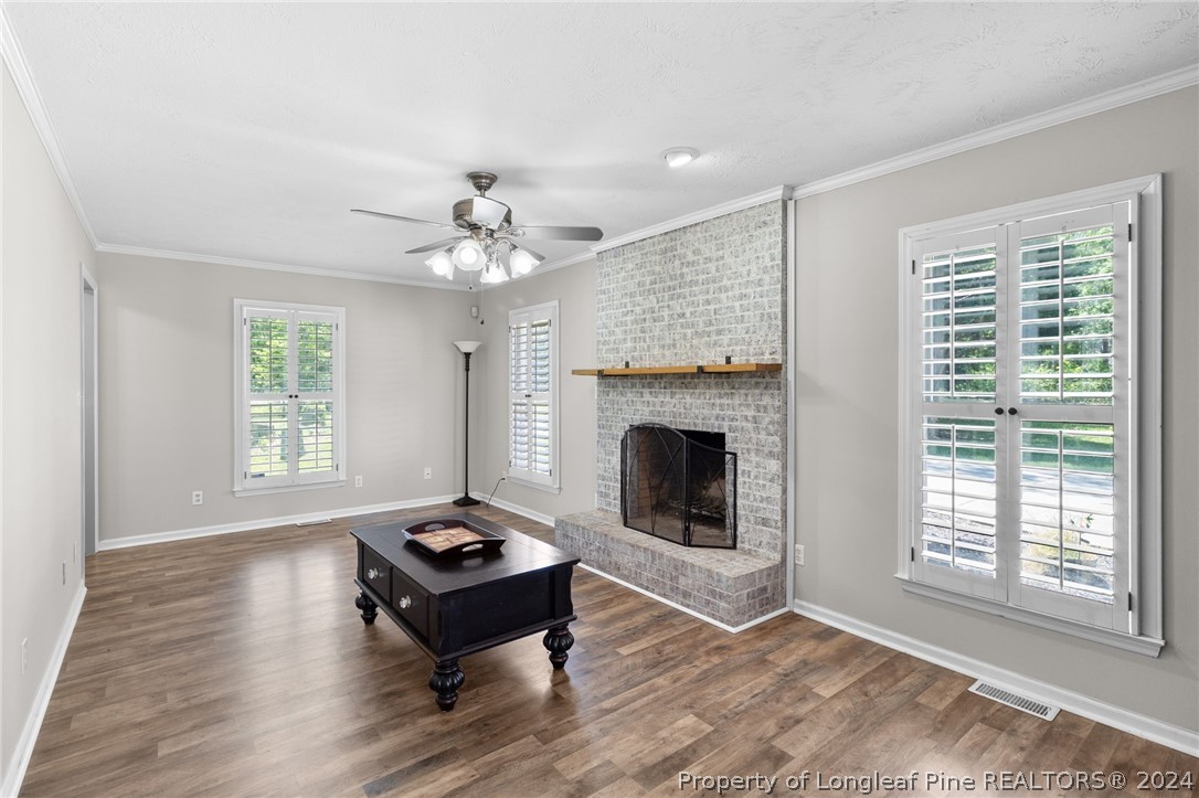 1177 Palestine Road Linden, NC 28356 - Photo 5 of 46 a living room with furniture and a fireplace