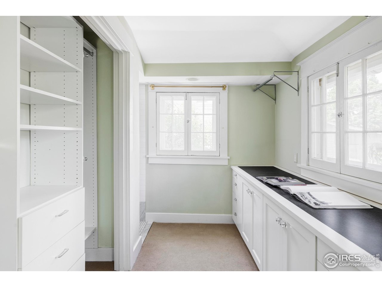 2424 4th Street Boulder, CO 80304 - Photo 14 of 29 a kitchen with granite countertop a stove and a window