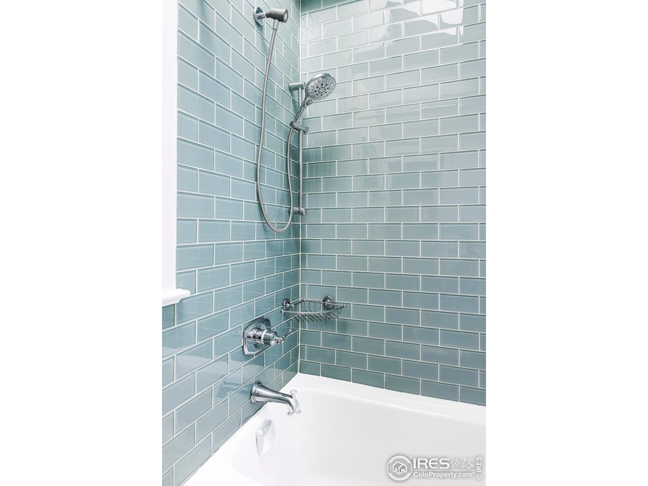 2424 4th Street Boulder, CO 80304 - Photo 21 of 29 a bathroom with a bathtub and shower