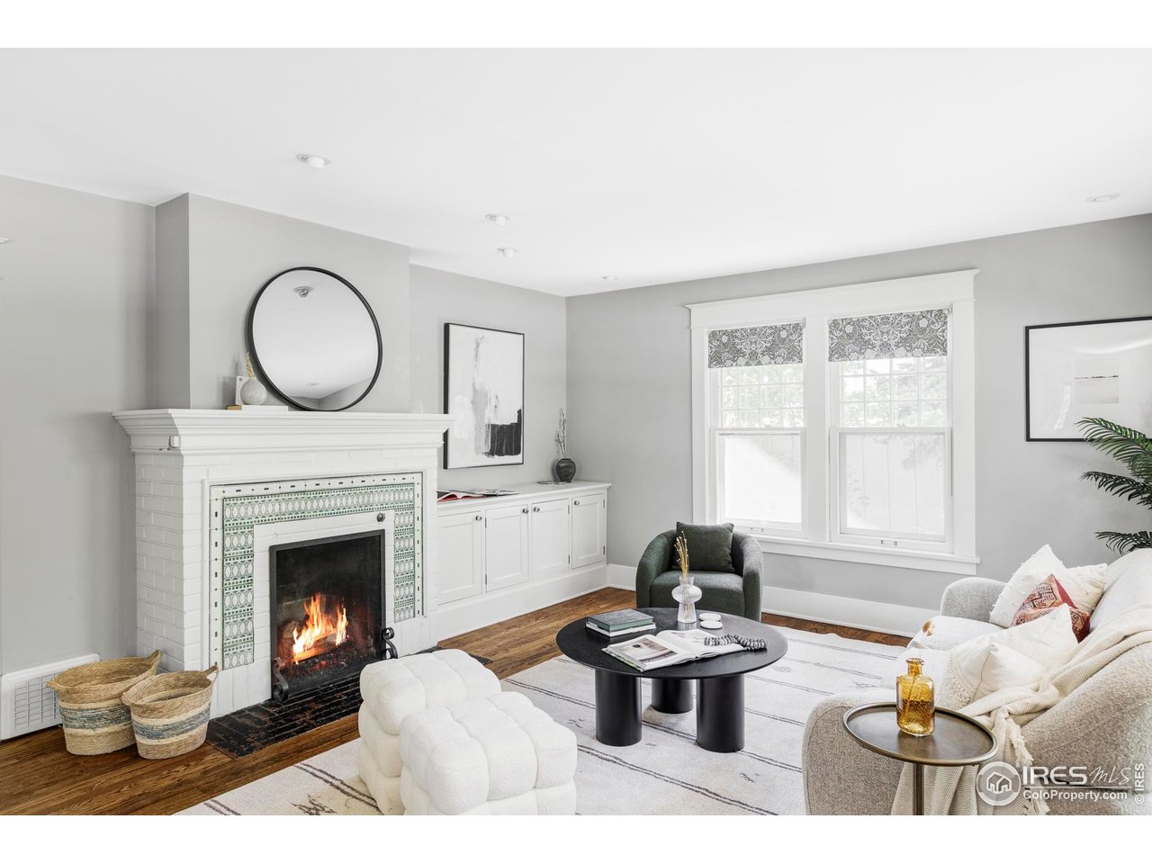 2424 4th Street Boulder, CO 80304 - Photo 7 of 29 a living room with furniture a fireplace and window