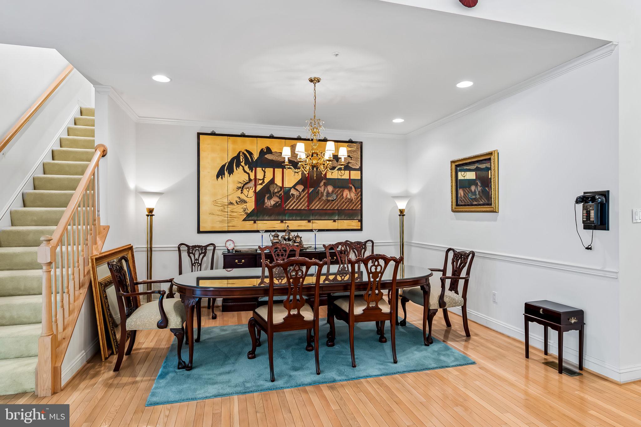 16 Roland Green, Unit 8 Baltimore, MD 21210 - Photo 12 of 55 a view of a a dining room with furniture window and wooden floor