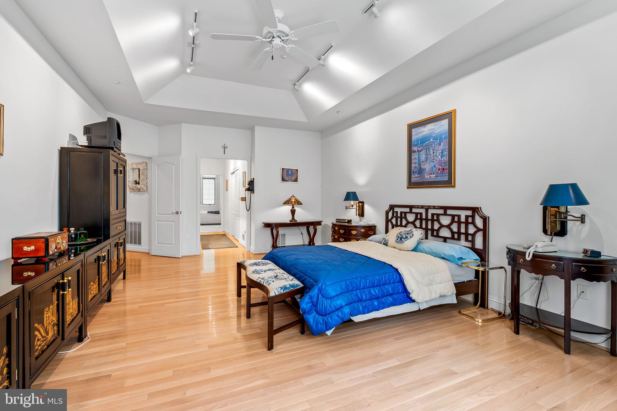 16 Roland Green, Unit 8 Baltimore, MD 21210 - Photo 28 of 55 a living room with furniture and a flat screen tv