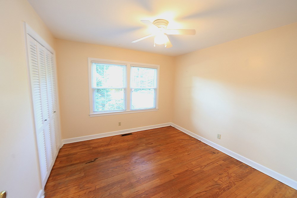 409 Vernon Terrace Raleigh, NC 27609 - Photo 9 of 23 Main Floor Bedroom with Dual Windows and Ceiling Fan Bedroom