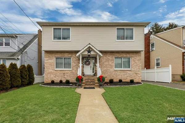 a front view of house with yard
