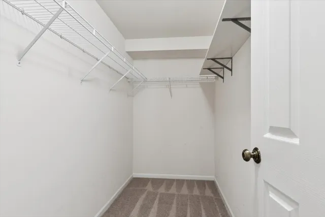 a view of a room with racks on the wall