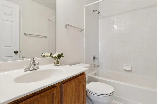 a bathroom with a sink toilet and a bathtub