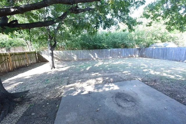 a front view of a house with a garage