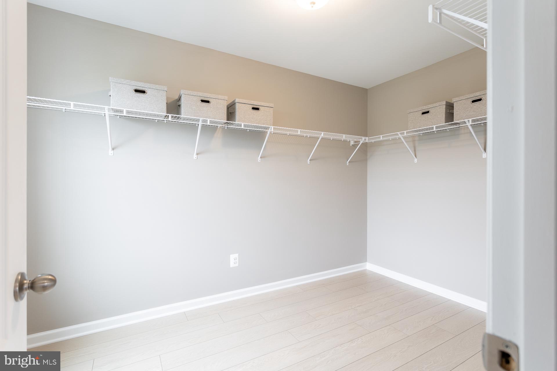 702 Marquee Farm Road Charles Town, WV 25414 - Photo 23 of 40 a view of small space with racks on the wall