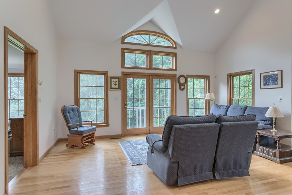 10 Farley Brook Road Chelmsford, MA 01824 - Photo 18 of 30 a living room with furniture and a window