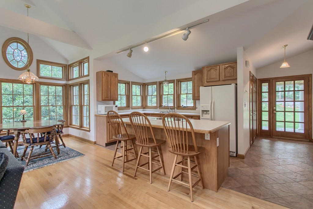 10 Farley Brook Road Chelmsford, MA 01824 - Photo 20 of 30 a view of a dining room with furniture window and outside view