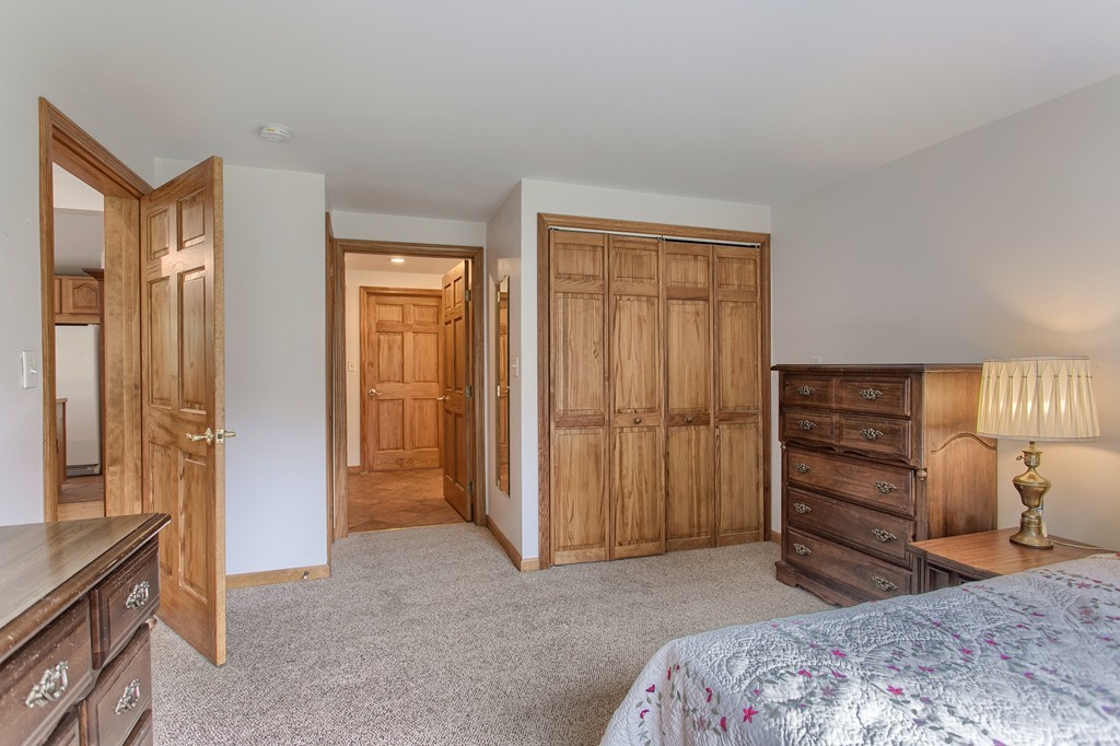 10 Farley Brook Road Chelmsford, MA 01824 - Photo 22 of 30 a bedroom with a bed and a closet
