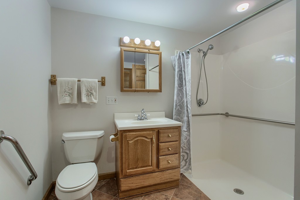 10 Farley Brook Road Chelmsford, MA 01824 - Photo 23 of 30 a bathroom with a granite countertop sink toilet and shower