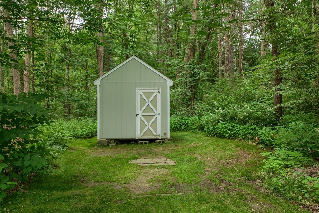 10 Farley Brook Road Chelmsford, MA 01824 - Photo 25 of 30 a view of a small house with a yard