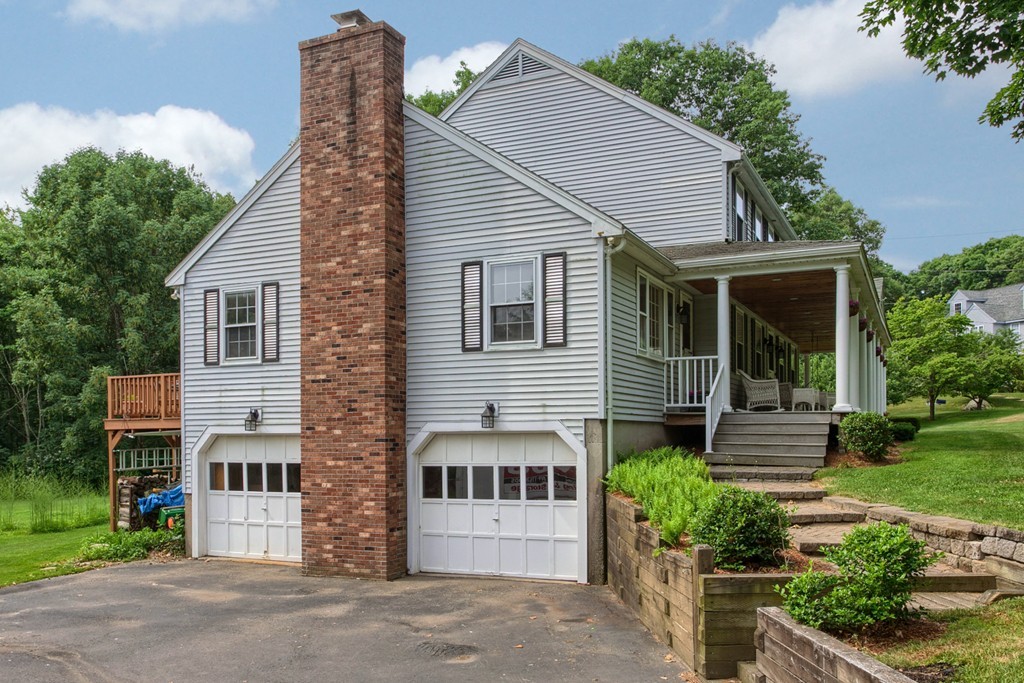 10 Farley Brook Road Chelmsford, MA 01824 - Photo 27 of 30 front view of a house with a yard